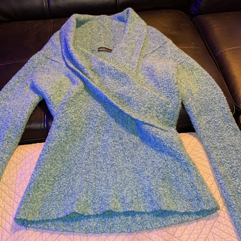 Super cute sweater color is greenish blue dark turquoise color. - Picture 5 of 6